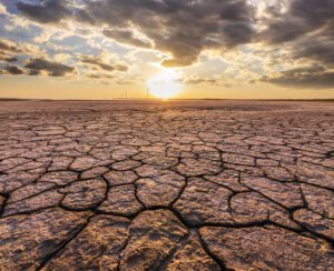 desert-with-cracked-ground-at-sunset-ecological