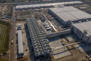 Aerial view of Microsoft’s Fairwater AI data center campus in Mt. Pleasant, Wisconsin, a high-density, purpose-built facility designed to support large-scale AI workloads and significant electricity demand. Courtesy: Microsoft